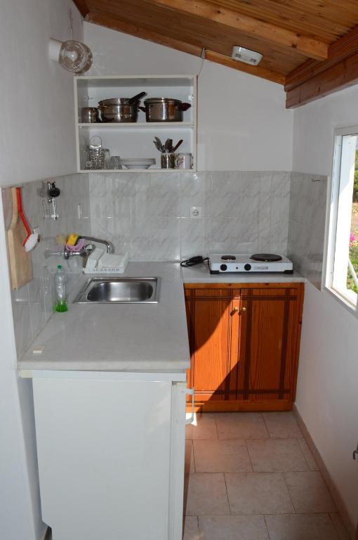 Theodore Apartments Zaháro Szoba fotó