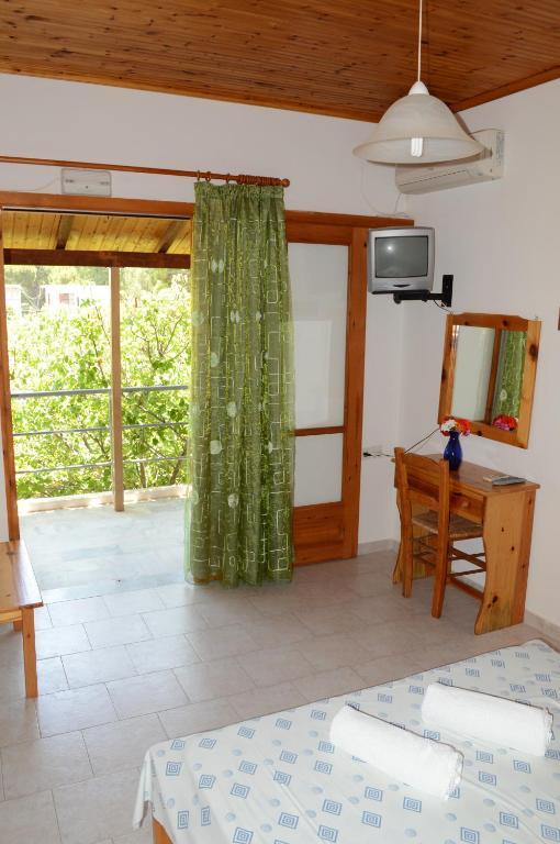 Theodore Apartments Zaháro Szoba fotó