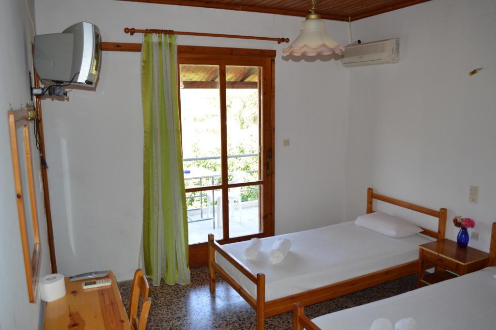 Theodore Apartments Zaháro Szoba fotó